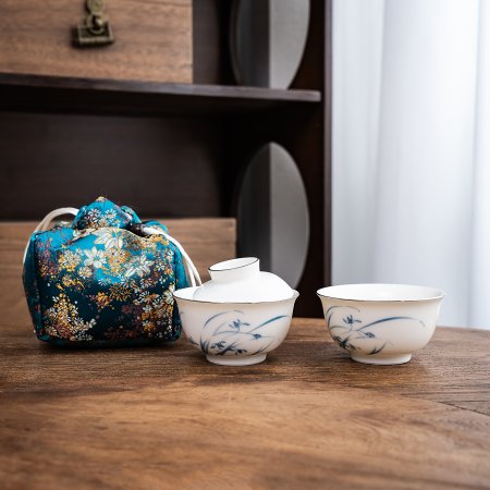 Sophisticated New Chinese Style Portable Porcelain Tea Set With Ornate Travel Bag