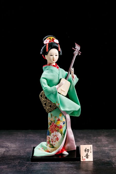 Japanese Geisha Statue Doll With Green Kimono